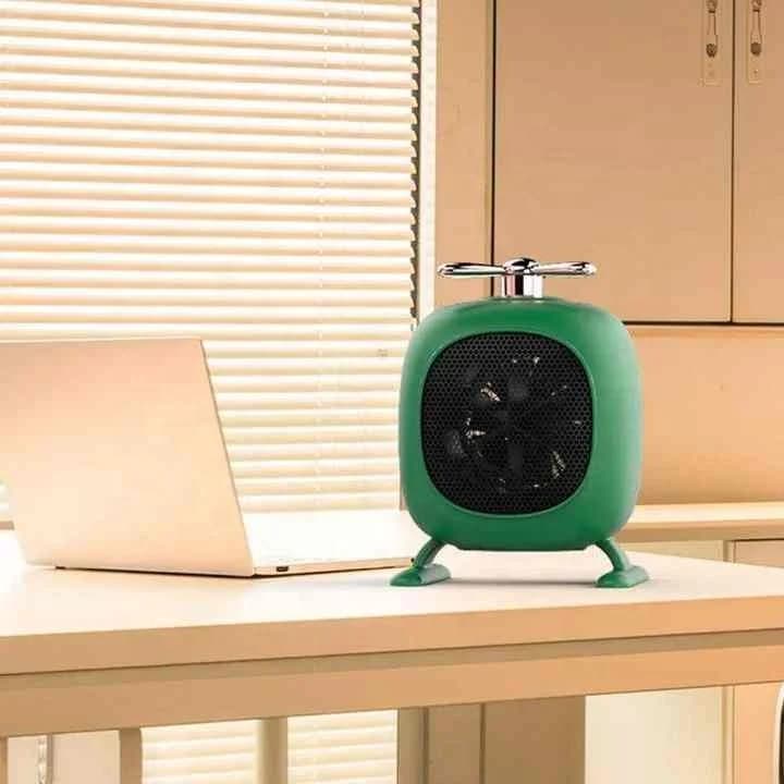 The New Small Mini Helicopter Shape Desktop Heater Energy-saving Energy-saving Small Household Portable Heater 5